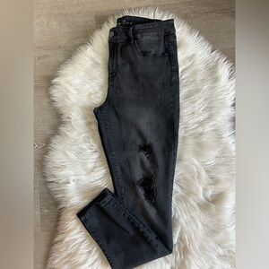 White House Black Market black skinny ankle jean. Distressed w/sequins. Size 10.